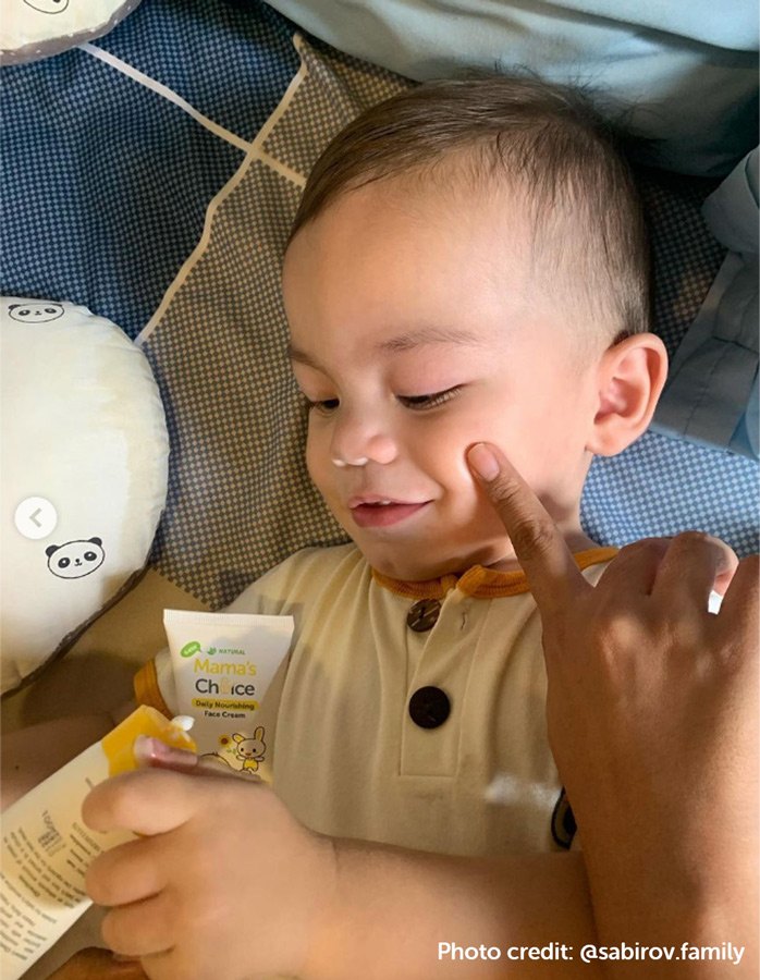 Baby-using-daily-nourishing-face-cream