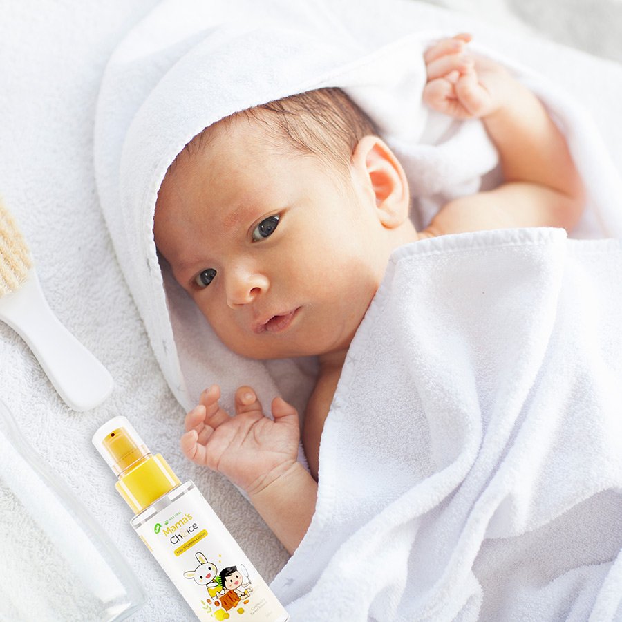 Baby using Hair Vitamin Lotion